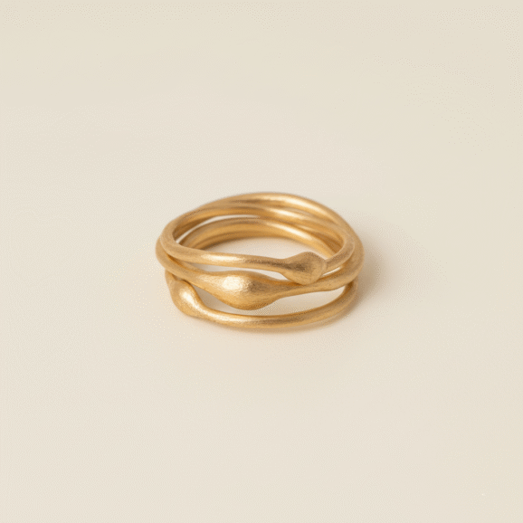 שירלי קורן שלישיית טבעות זהב 18 קראט בעיצוב אמורפי עם עין אמצעית – עבודת יד