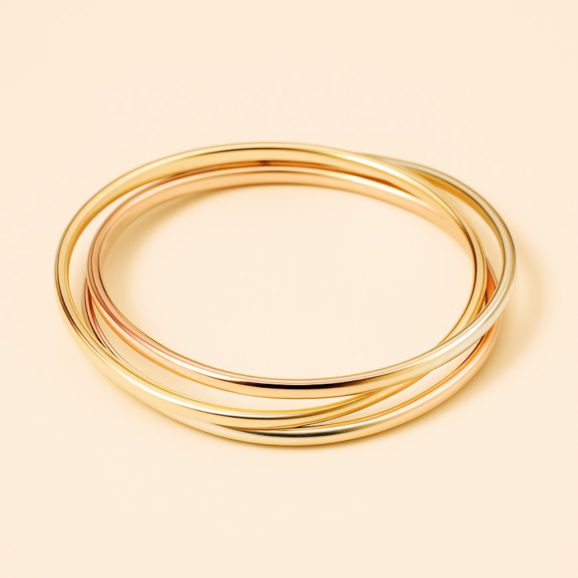 שלישיית צמידי זהב מחוברים 14 קראט בשלושה גווני זהב