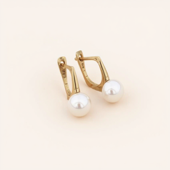 עגילי זהב עם פניני מים מתוקים עגולות בעבודת יד